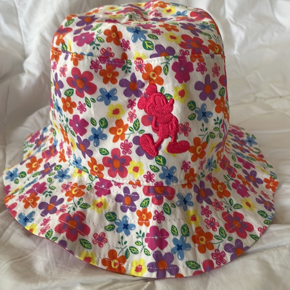 EUC Disney reversible floral hat with Mickey Mouse pattern on reverse side